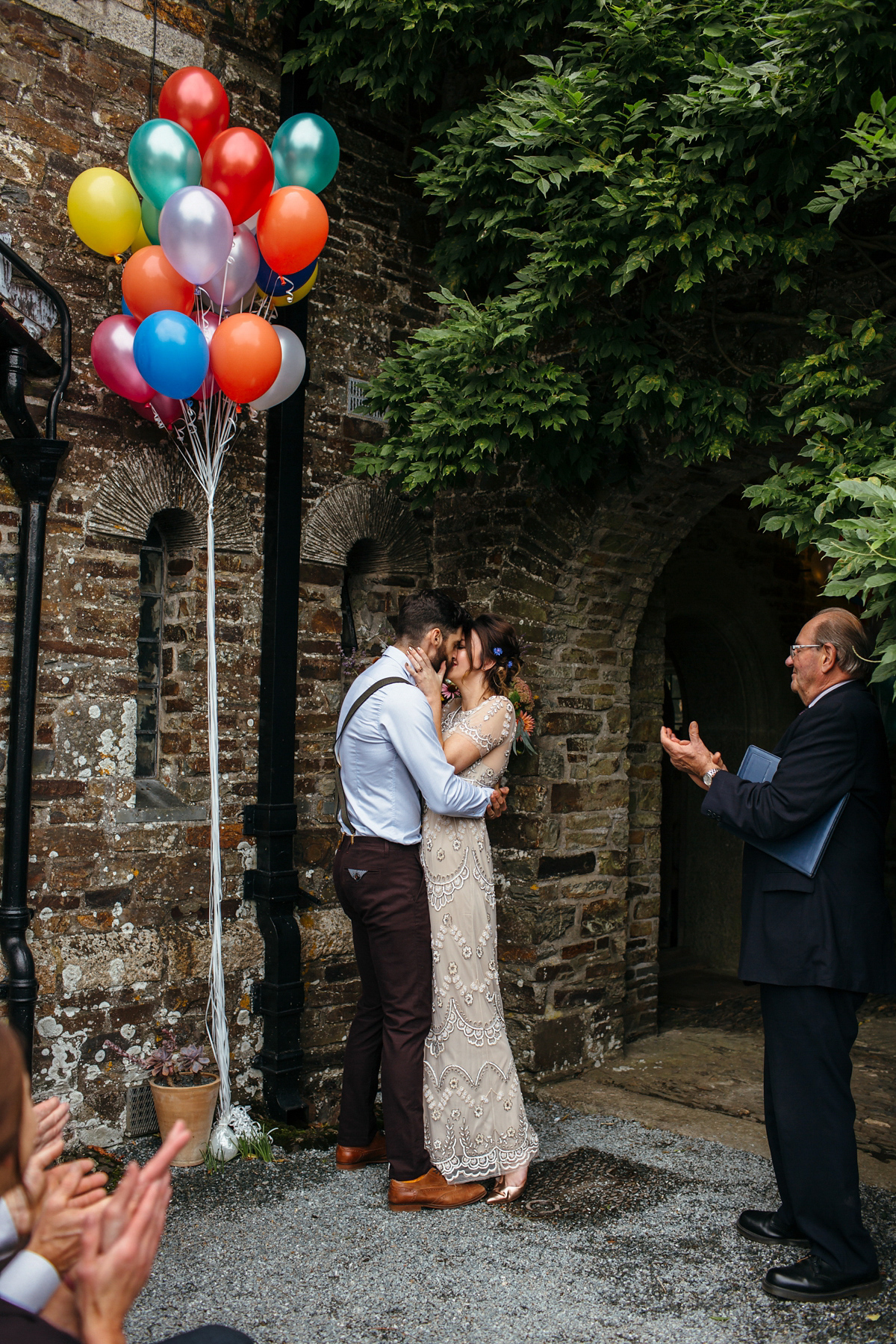 Emily wore a Needle & Thread dress for her colourful, balloon and glitter filled wedding at Coombe Trenchard. Images by Freckle Photography.