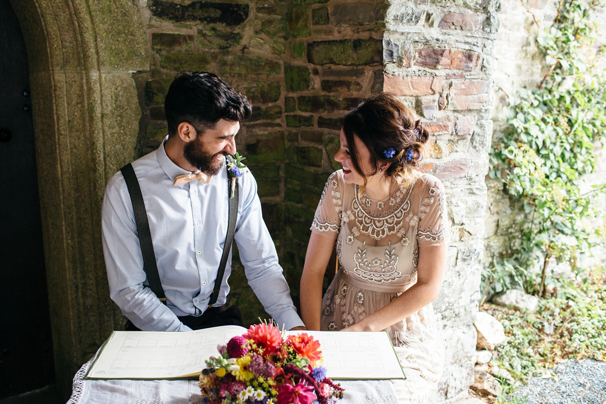 Emily wore a Needle & Thread dress for her colourful, balloon and glitter filled wedding at Coombe Trenchard. Images by Freckle Photography.