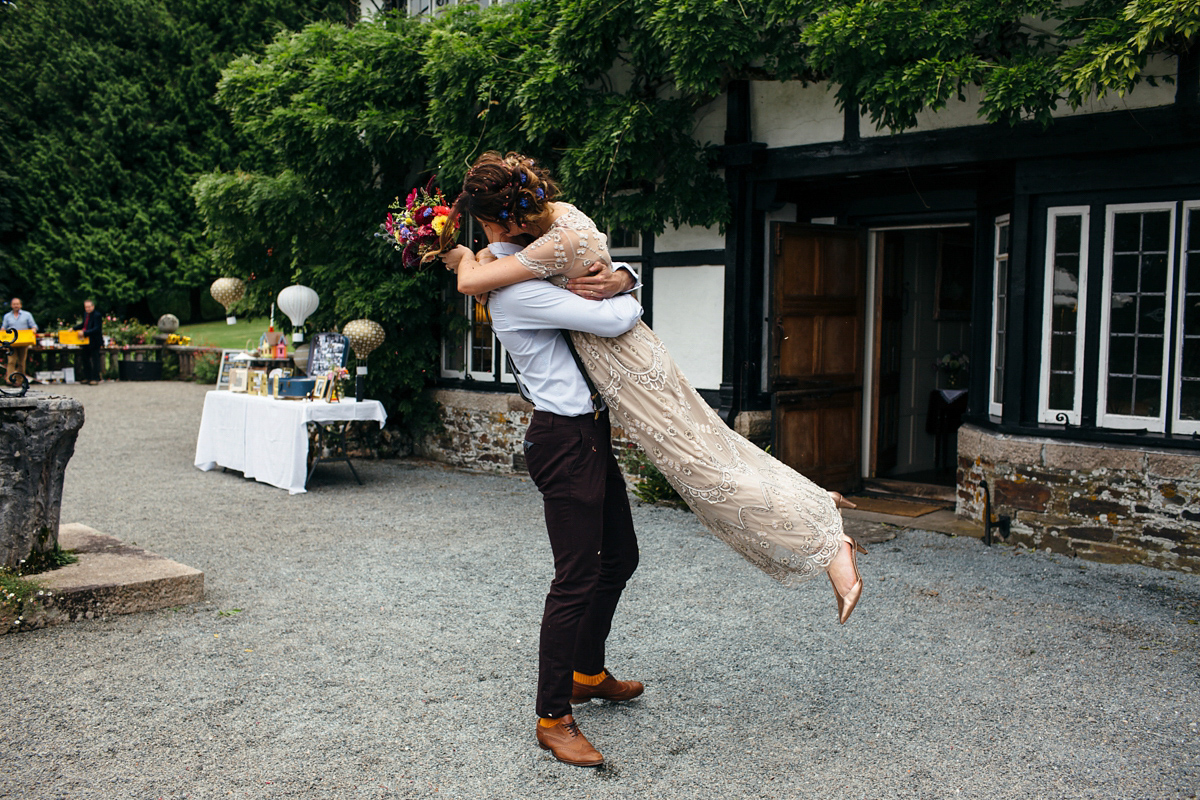 Emily wore a Needle & Thread dress for her colourful, balloon and glitter filled wedding at Coombe Trenchard. Images by Freckle Photography.