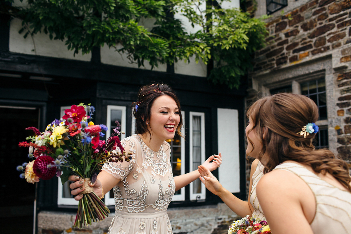 Emily wore a Needle & Thread dress for her colourful, balloon and glitter filled wedding at Coombe Trenchard. Images by Freckle Photography.