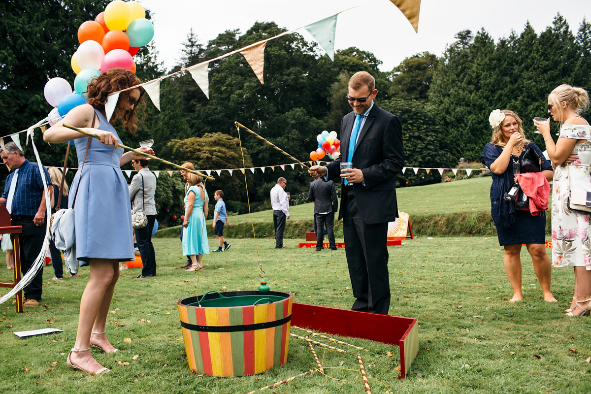 Emily wore a Needle & Thread dress for her colourful, balloon and glitter filled wedding at Coombe Trenchard. Images by Freckle Photography.