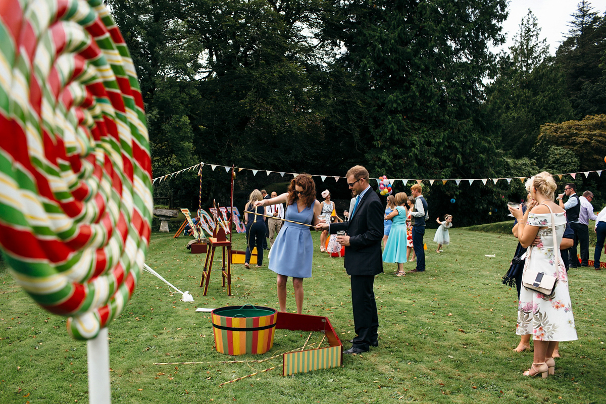 Emily wore a Needle & Thread dress for her colourful, balloon and glitter filled wedding at Coombe Trenchard. Images by Freckle Photography.