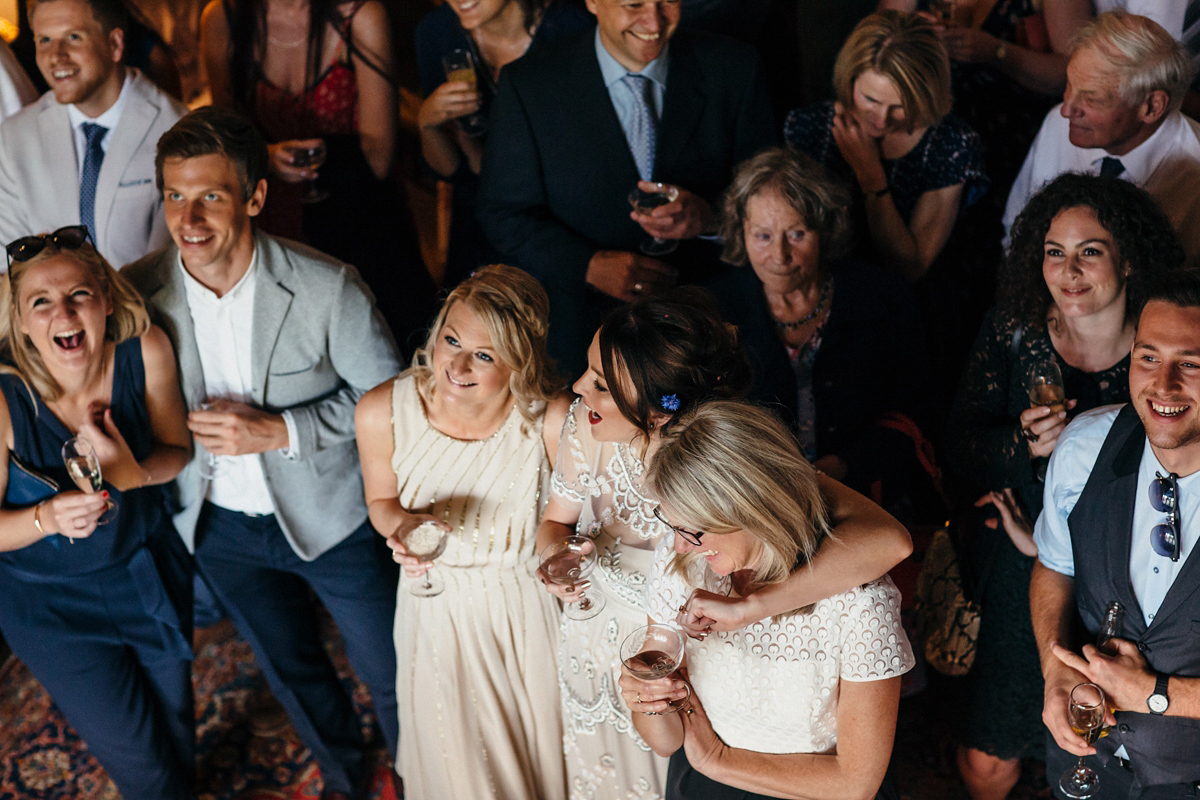 Emily wore a Needle & Thread dress for her colourful, balloon and glitter filled wedding at Coombe Trenchard. Images by Freckle Photography.