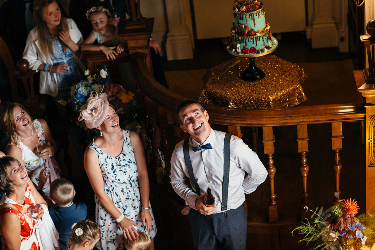 Emily wore a Needle & Thread dress for her colourful, balloon and glitter filled wedding at Coombe Trenchard. Images by Freckle Photography.