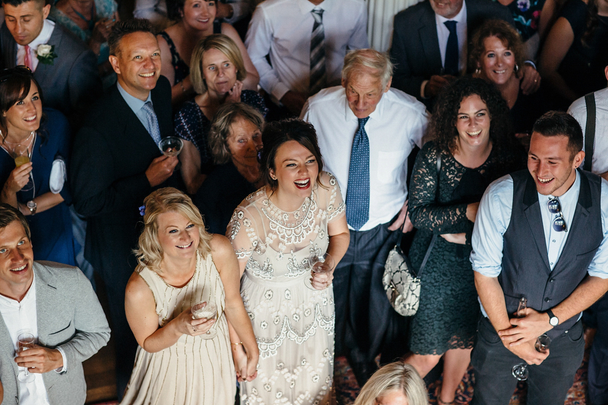 Emily wore a Needle & Thread dress for her colourful, balloon and glitter filled wedding at Coombe Trenchard. Images by Freckle Photography.