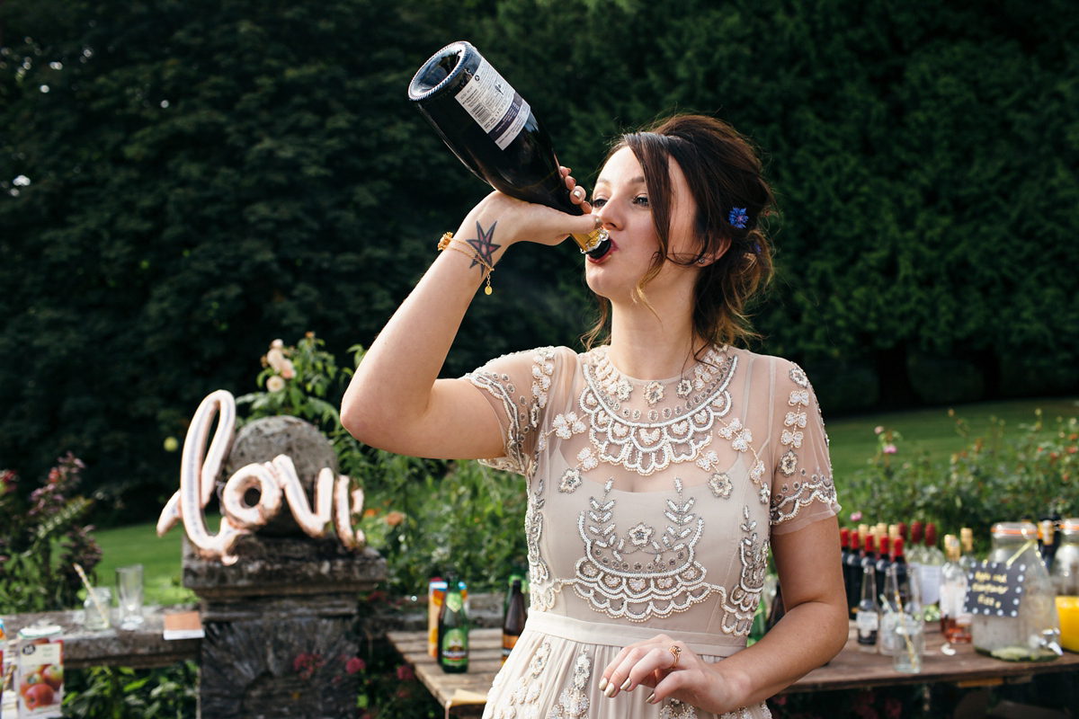 Emily wore a Needle & Thread dress for her colourful, balloon and glitter filled wedding at Coombe Trenchard. Images by Freckle Photography.