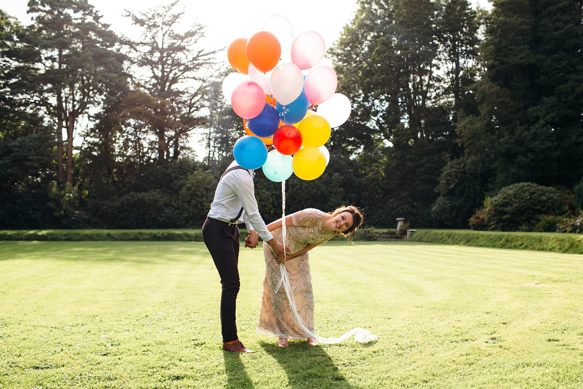 Emily wore a Needle & Thread dress for her colourful, balloon and glitter filled wedding at Coombe Trenchard. Images by Freckle Photography.