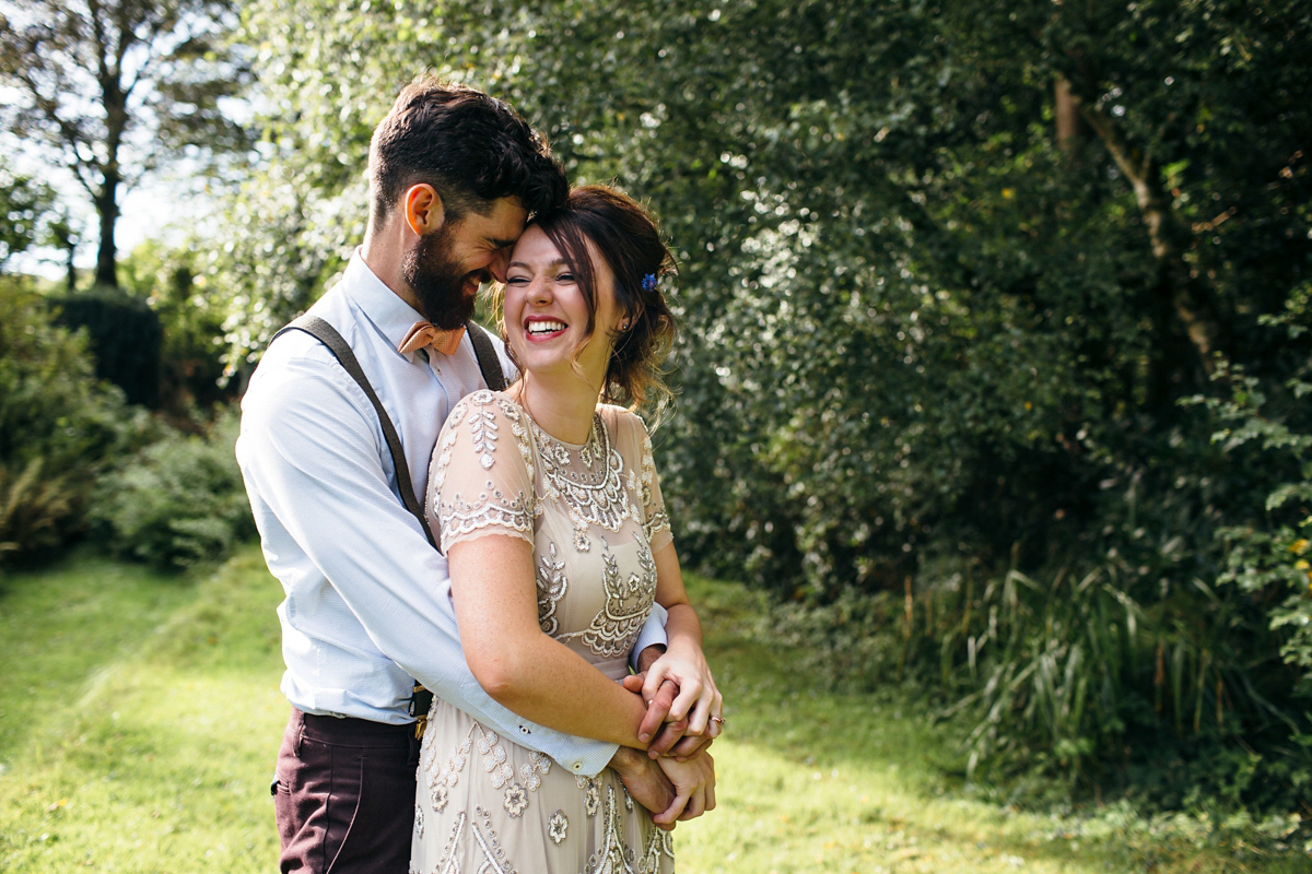 Emily wore a Needle & Thread dress for her colourful, balloon and glitter filled wedding at Coombe Trenchard. Images by Freckle Photography.