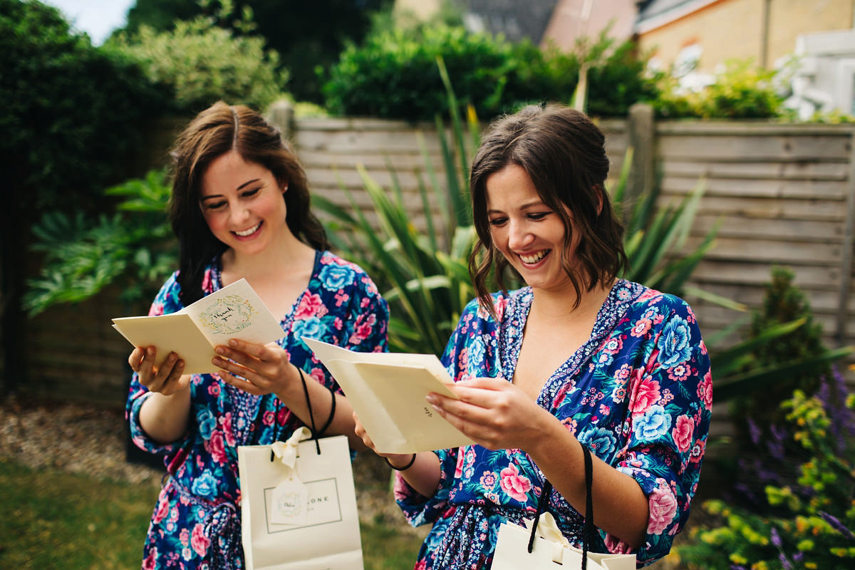 Sarah wore a Grace Loves Lace dress for her rustic Dorset barn wedding with paper cranes. Photography by Richard Skins.