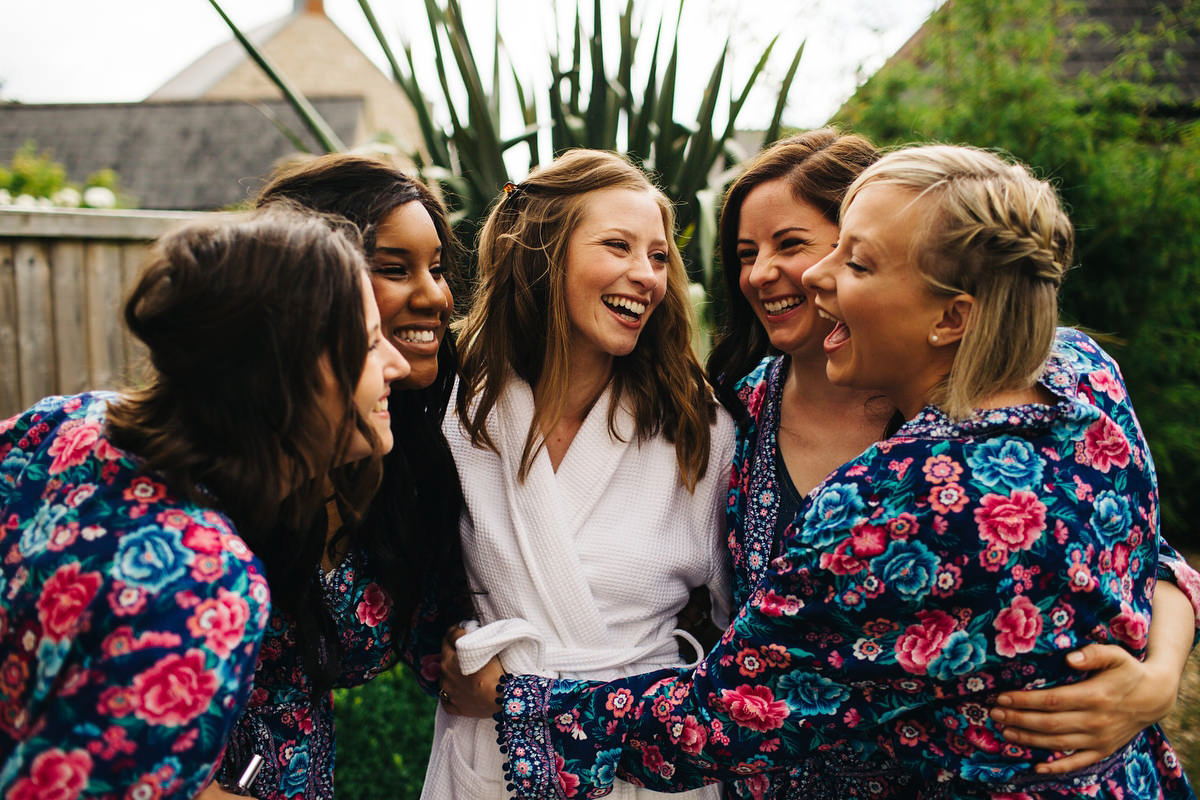 Sarah wore a Grace Loves Lace dress for her rustic Dorset barn wedding with paper cranes. Photography by Richard Skins.