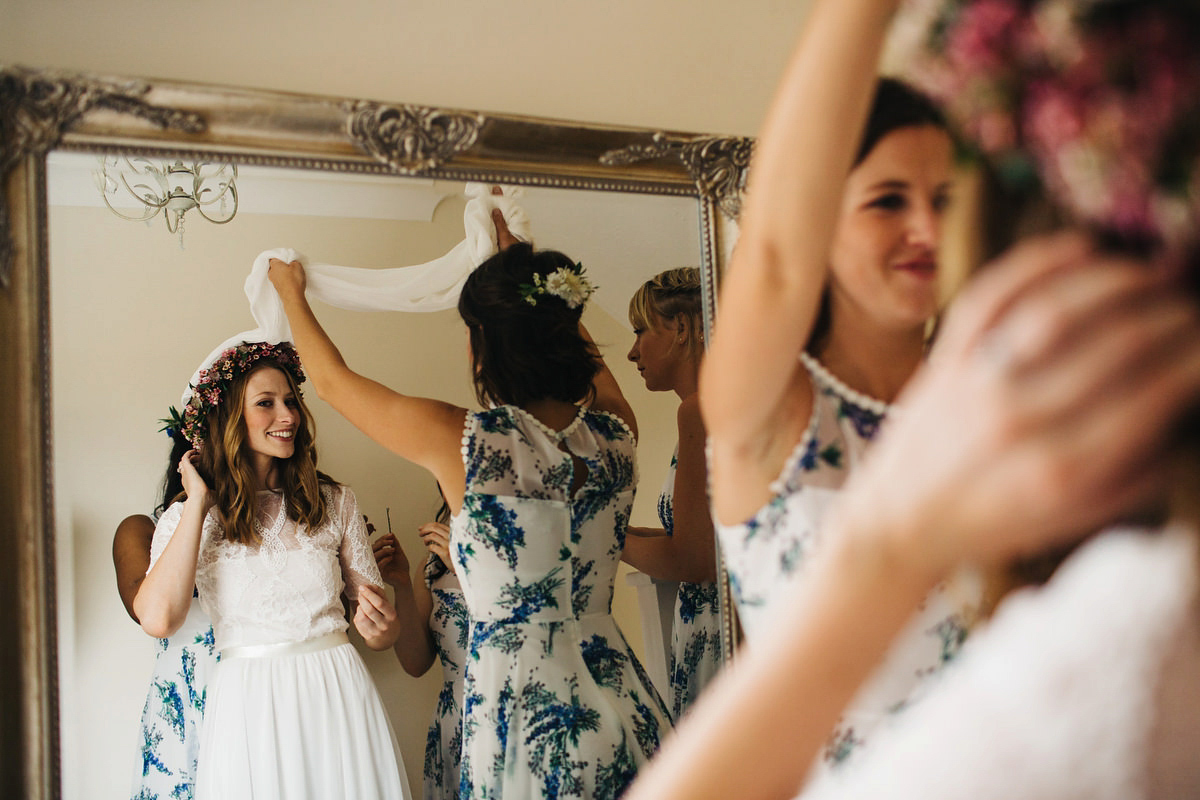 Sarah wore a Grace Loves Lace dress for her rustic Dorset barn wedding with paper cranes. Photography by Richard Skins.