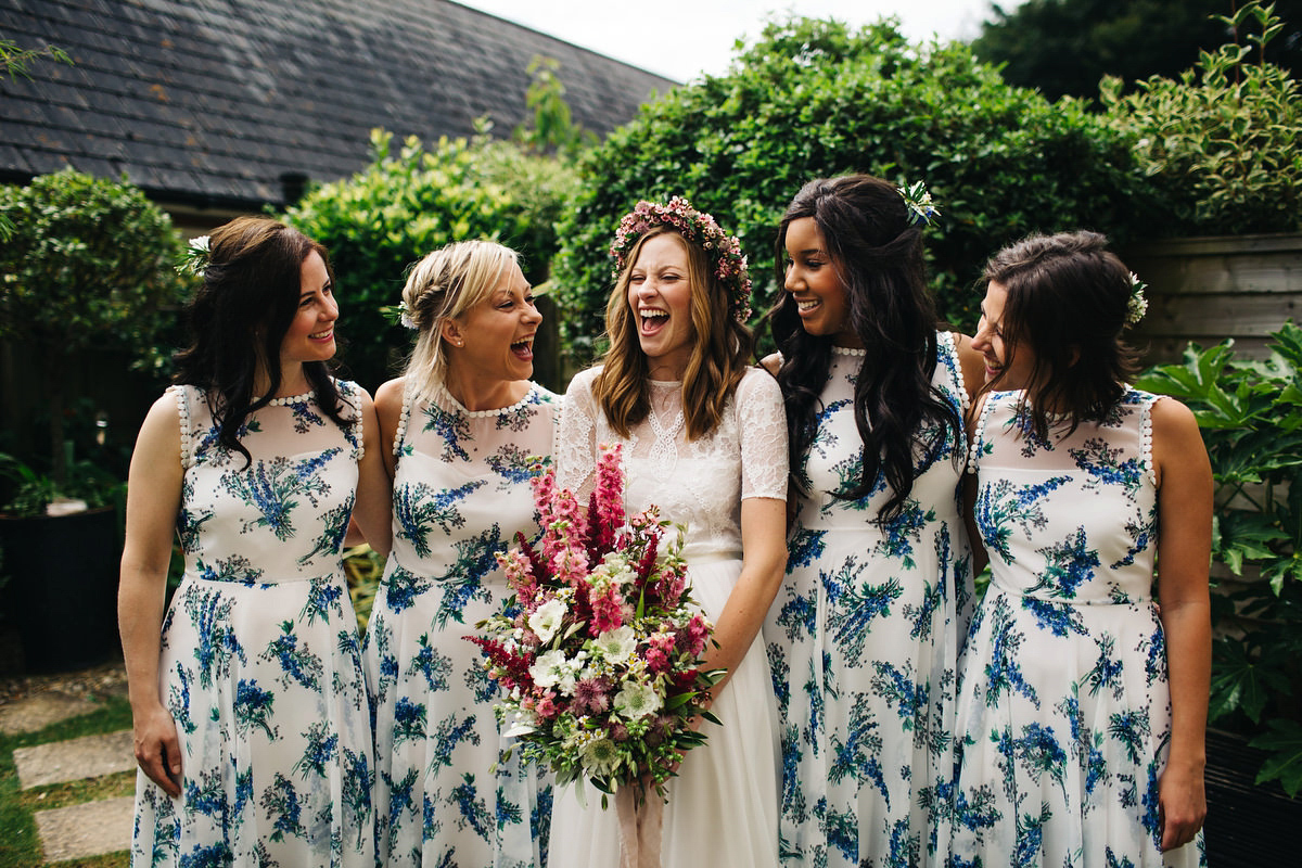 Sarah wore a Grace Loves Lace dress for her rustic Dorset barn wedding with paper cranes. Photography by Richard Skins.