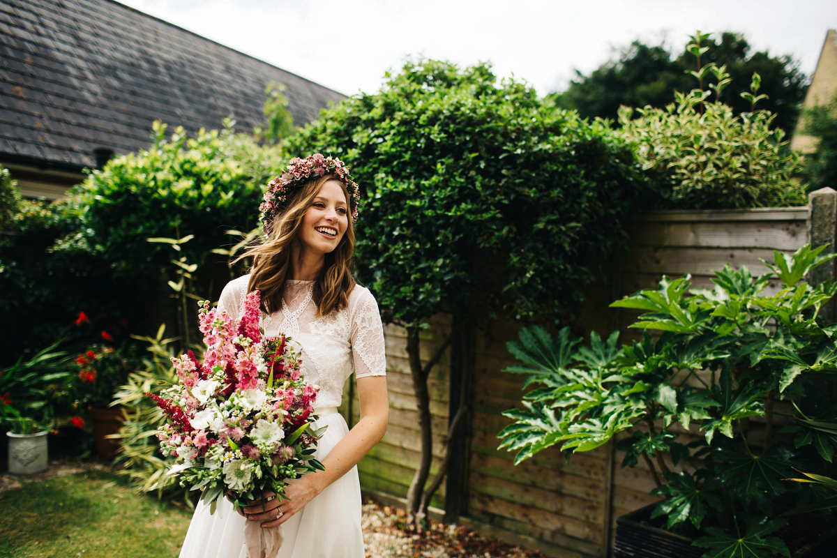 Sarah wore a Grace Loves Lace dress for her rustic Dorset barn wedding with paper cranes. Photography by Richard Skins.