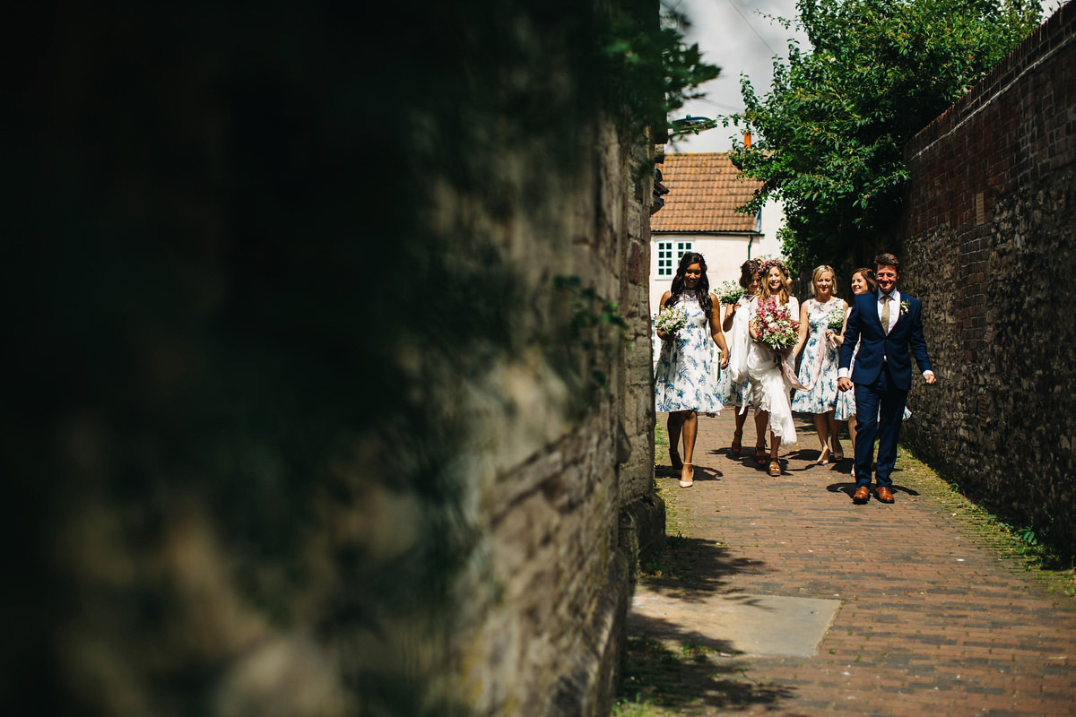 Sarah wore a Grace Loves Lace dress for her rustic Dorset barn wedding with paper cranes. Photography by Richard Skins.