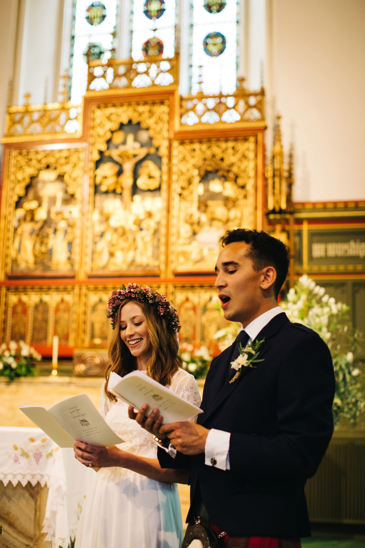 Sarah wore a Grace Loves Lace dress for her rustic Dorset barn wedding with paper cranes. Photography by Richard Skins.