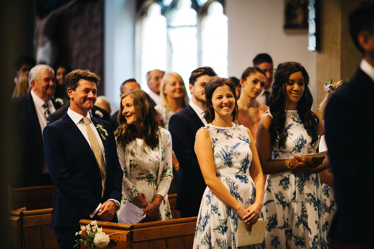 Sarah wore a Grace Loves Lace dress for her rustic Dorset barn wedding with paper cranes. Photography by Richard Skins.