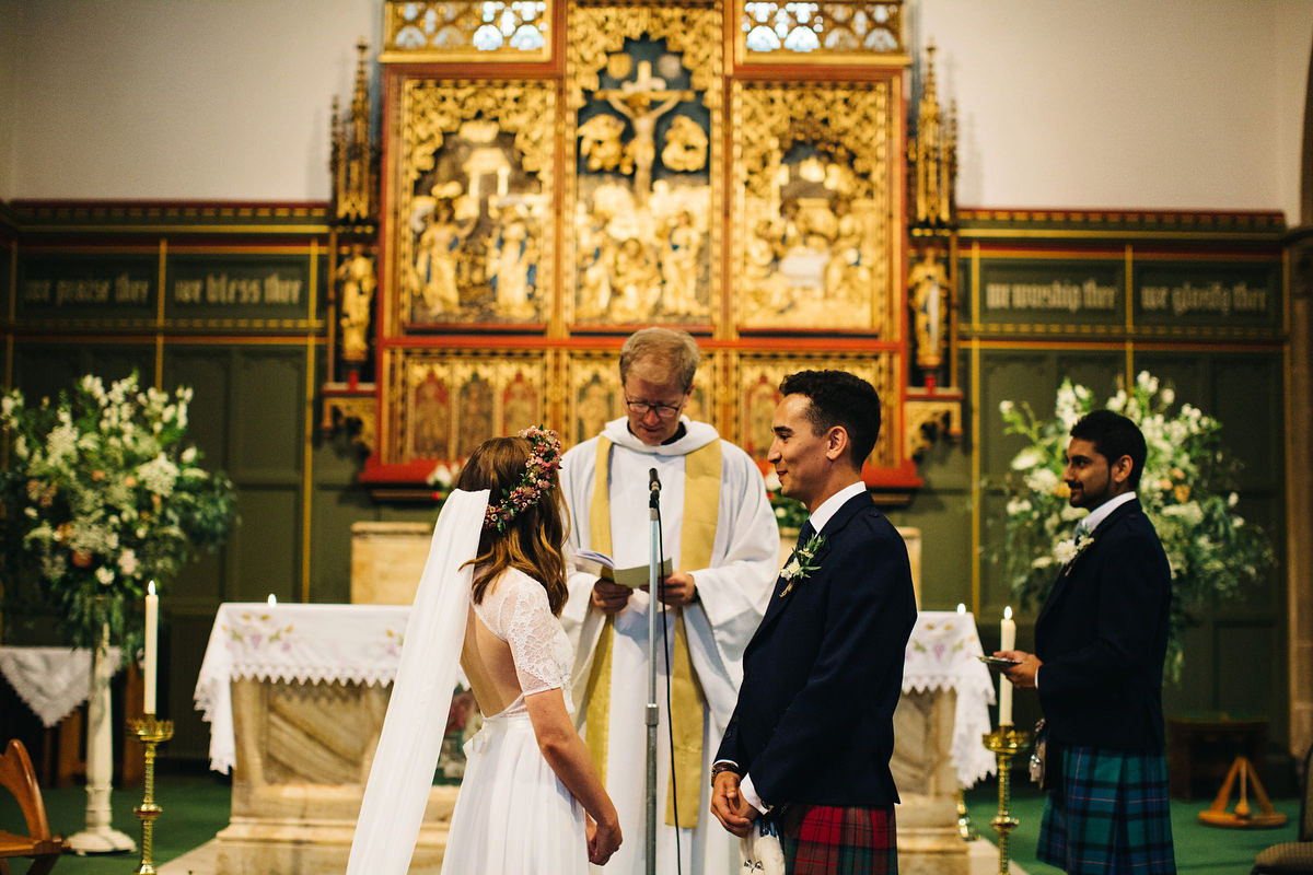 Sarah wore a Grace Loves Lace dress for her rustic Dorset barn wedding with paper cranes. Photography by Richard Skins.