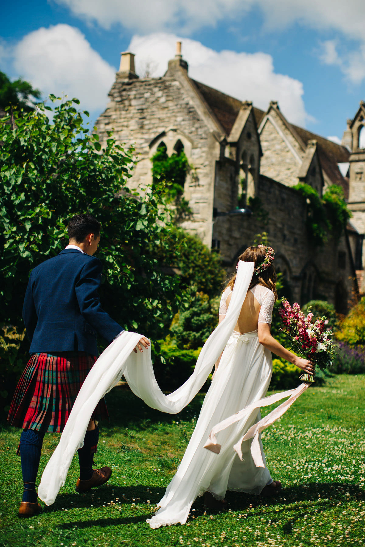 Sarah wore a Grace Loves Lace dress for her rustic Dorset barn wedding with paper cranes. Photography by Richard Skins.