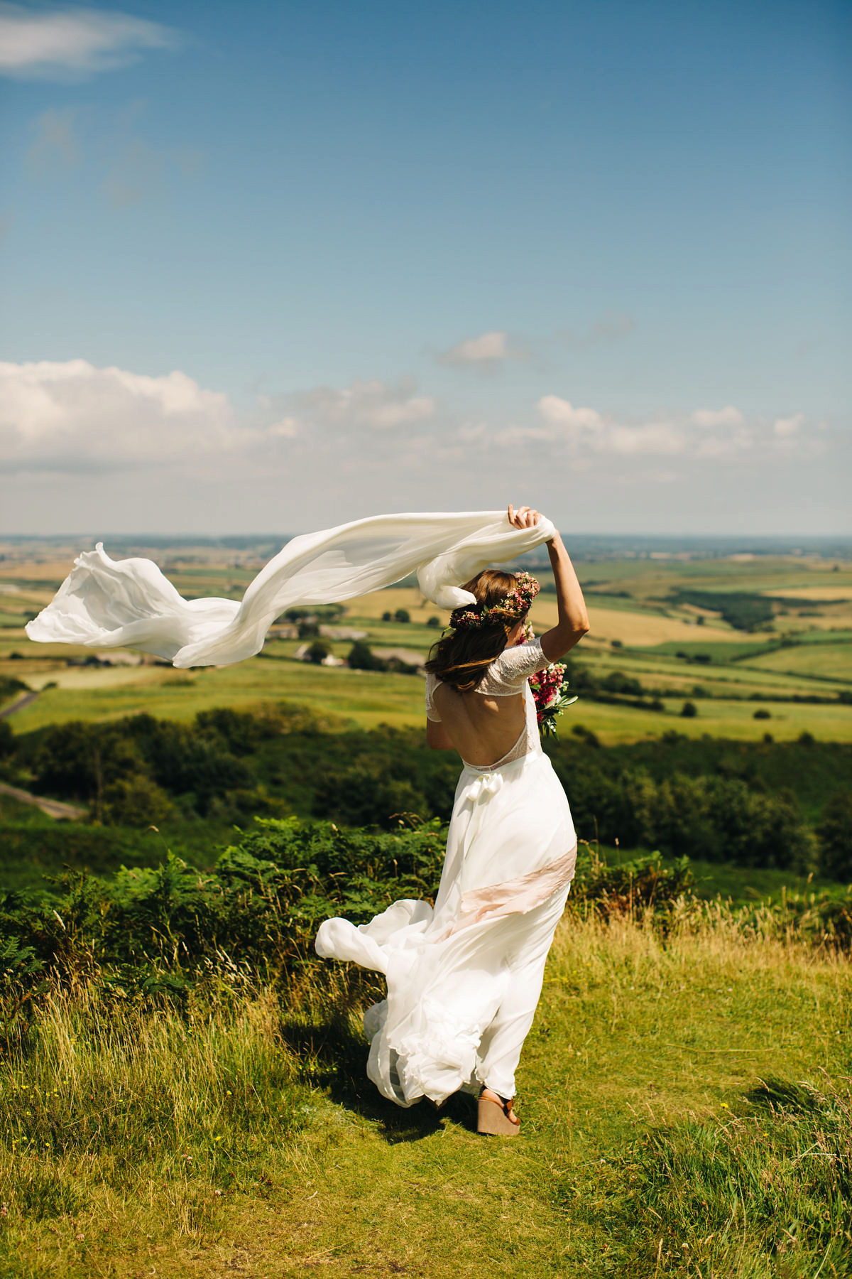 Sarah wore a Grace Loves Lace dress for her rustic Dorset barn wedding with paper cranes. Photography by Richard Skins.