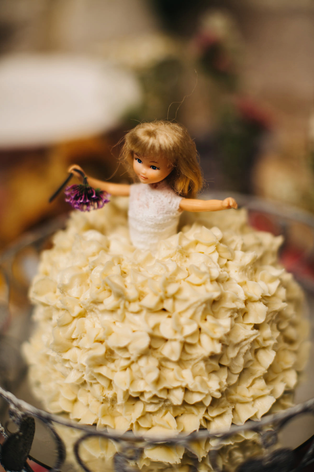 Sarah wore a Grace Loves Lace dress for her rustic Dorset barn wedding with paper cranes. Photography by Richard Skins.