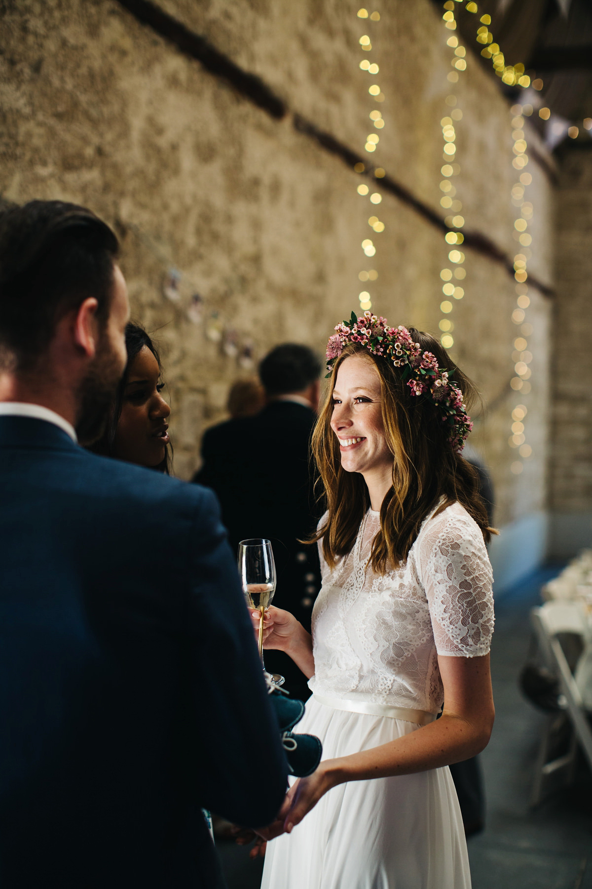 Sarah wore a Grace Loves Lace dress for her rustic Dorset barn wedding with paper cranes. Photography by Richard Skins.