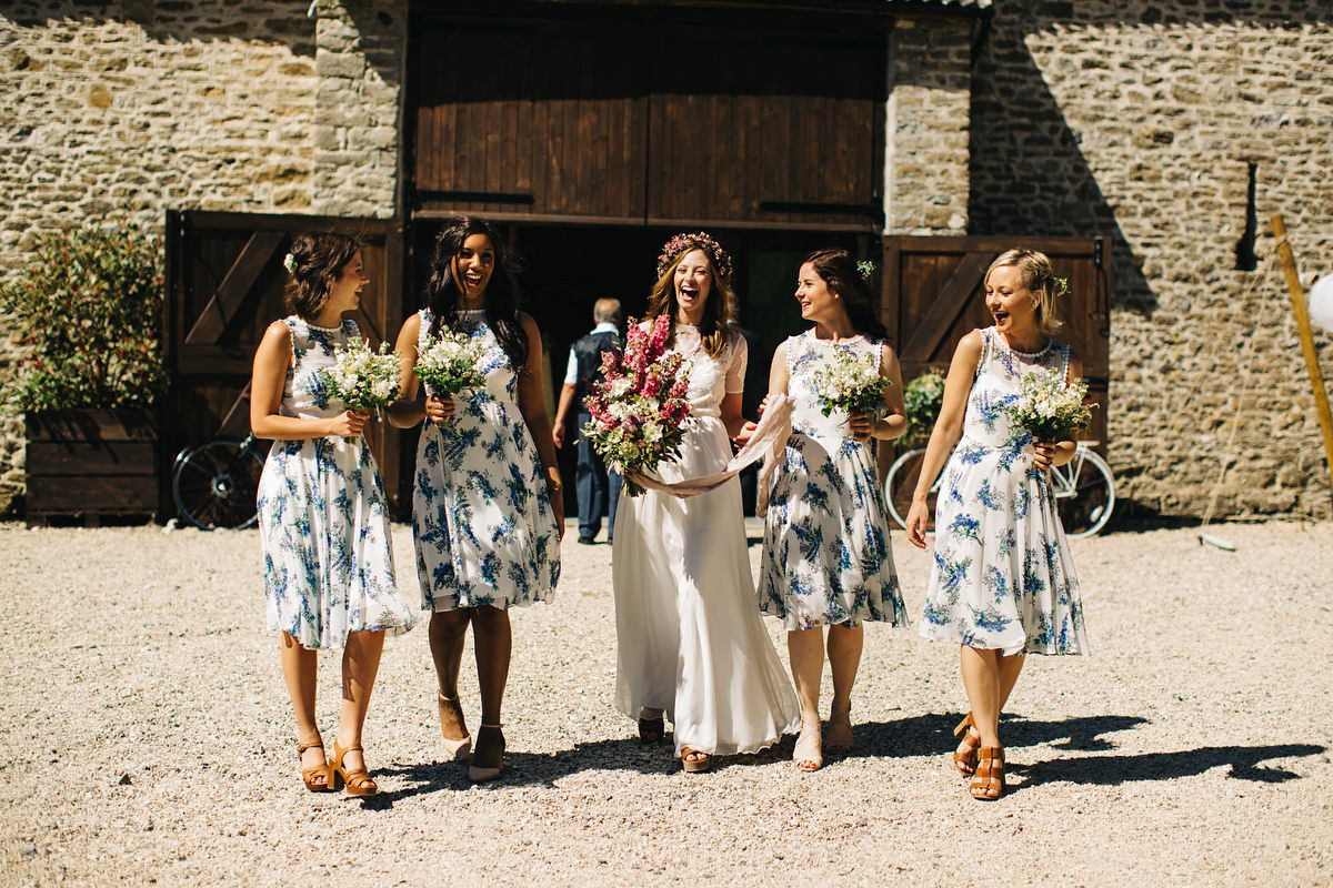 Sarah wore a Grace Loves Lace dress for her rustic Dorset barn wedding with paper cranes. Photography by Richard Skins.