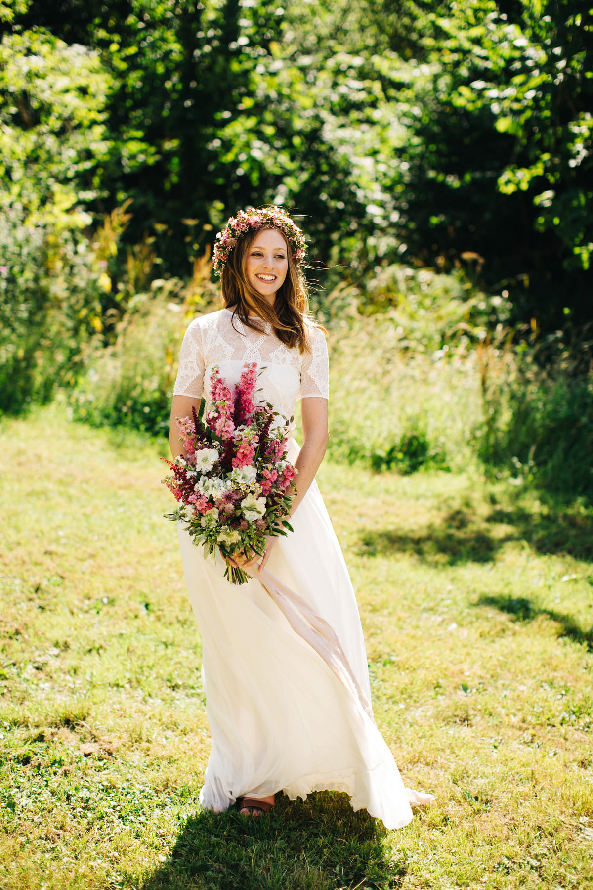 Sarah wore a Grace Loves Lace dress for her rustic Dorset barn wedding with paper cranes. Photography by Richard Skins.