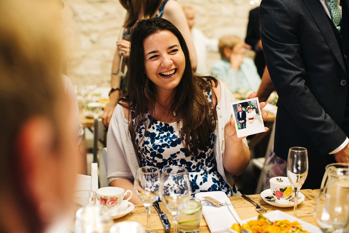 Sarah wore a Grace Loves Lace dress for her rustic Dorset barn wedding with paper cranes. Photography by Richard Skins.