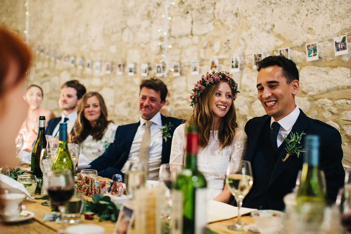 Sarah wore a Grace Loves Lace dress for her rustic Dorset barn wedding with paper cranes. Photography by Richard Skins.