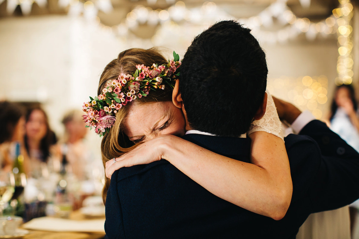 Sarah wore a Grace Loves Lace dress for her rustic Dorset barn wedding with paper cranes. Photography by Richard Skins.