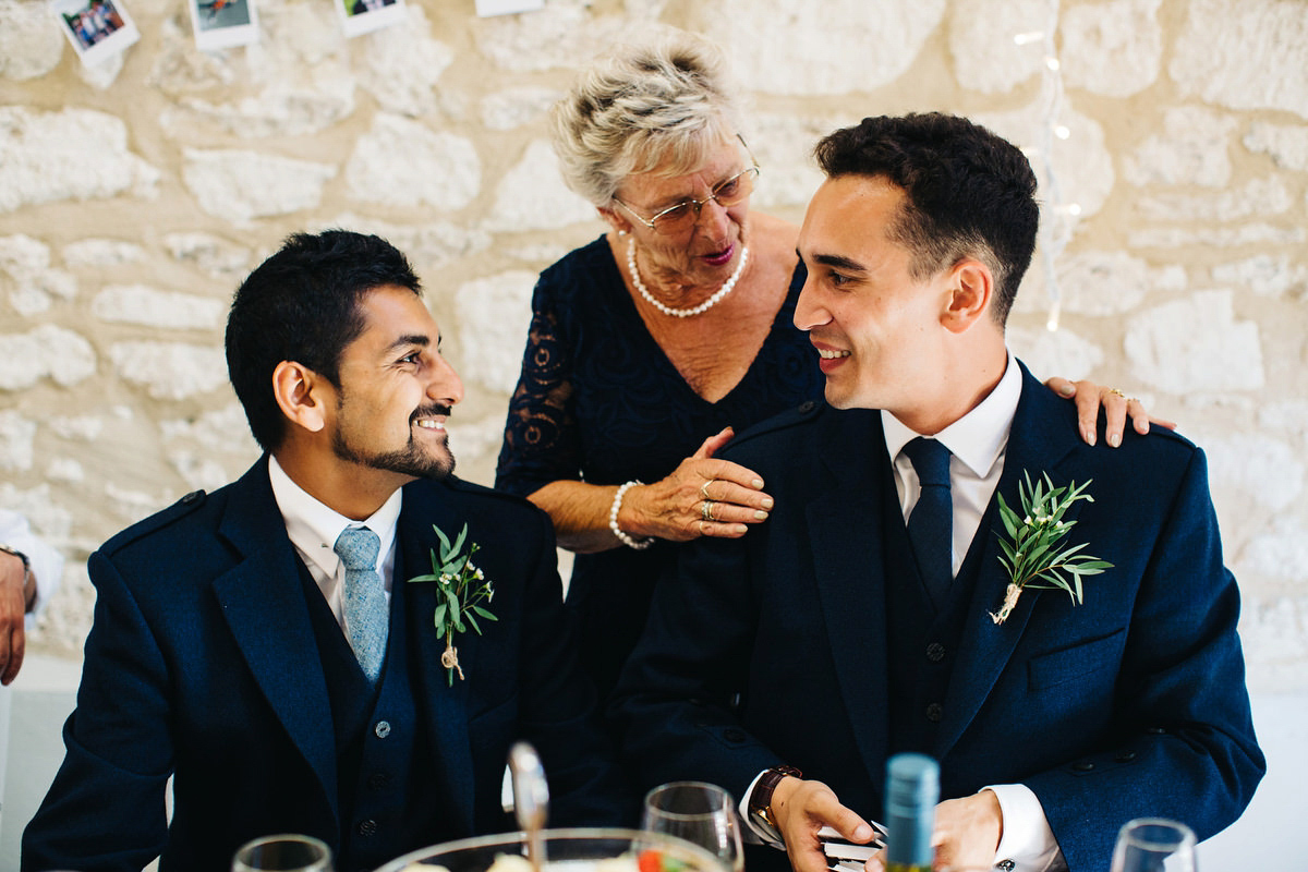 Sarah wore a Grace Loves Lace dress for her rustic Dorset barn wedding with paper cranes. Photography by Richard Skins.