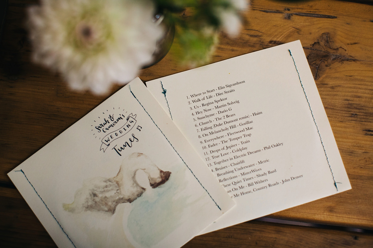 Sarah wore a Grace Loves Lace dress for her rustic Dorset barn wedding with paper cranes. Photography by Richard Skins.