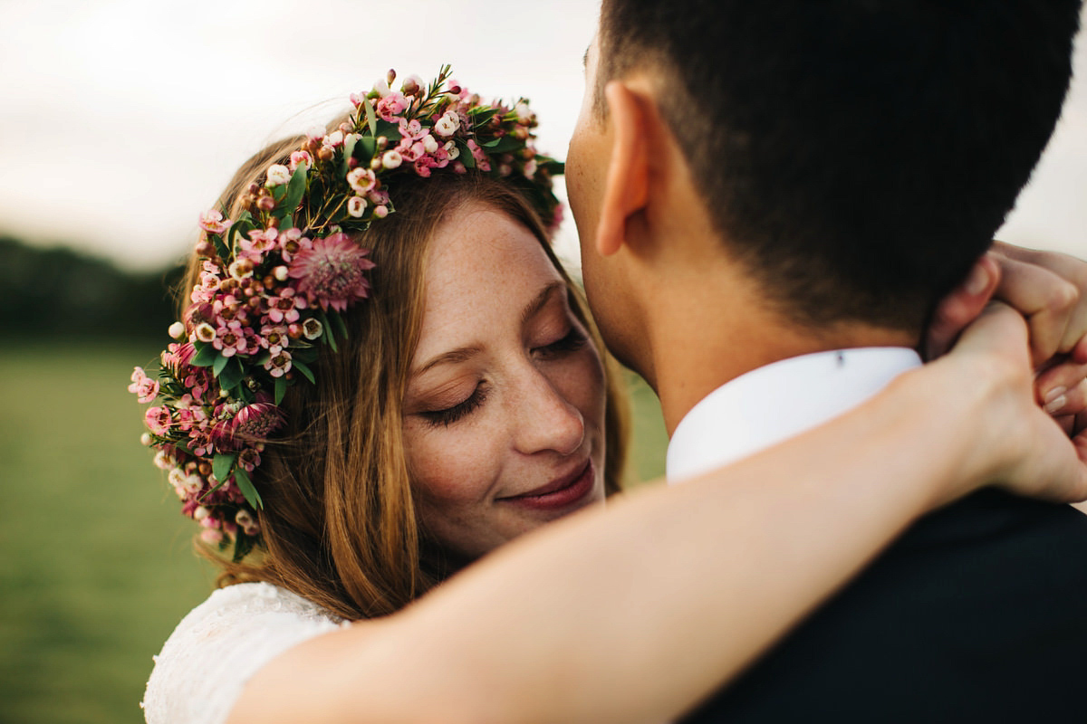 Sarah wore a Grace Loves Lace dress for her rustic Dorset barn wedding with paper cranes. Photography by Richard Skins.