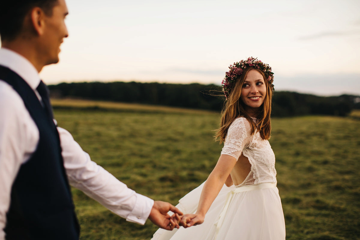 Sarah wore a Grace Loves Lace dress for her rustic Dorset barn wedding with paper cranes. Photography by Richard Skins.