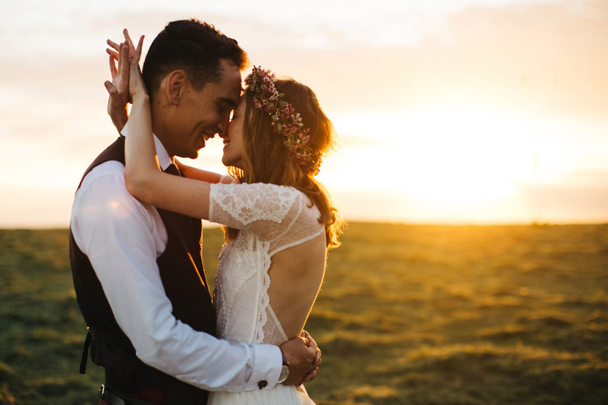 Sarah wore a Grace Loves Lace dress for her rustic Dorset barn wedding with paper cranes. Photography by Richard Skins.