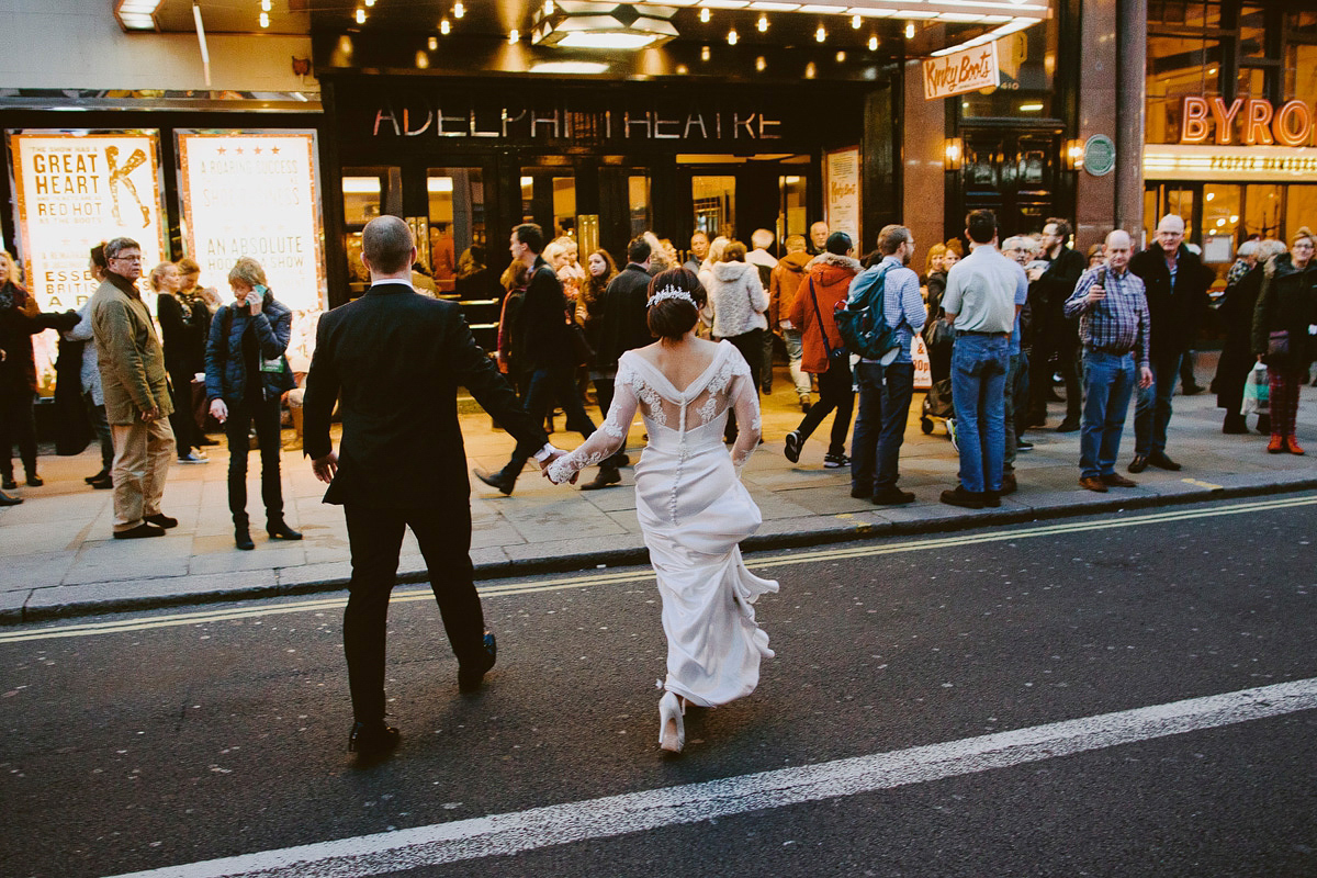 Antonietta wore a chic and elegant long sleeved Suzanne Neville gown for her black tie winter wedding at the RSA in London.