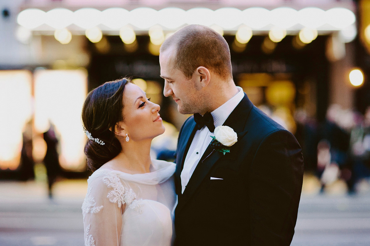 Antonietta wore a chic and elegant long sleeved Suzanne Neville gown for her black tie winter wedding at the RSA in London.