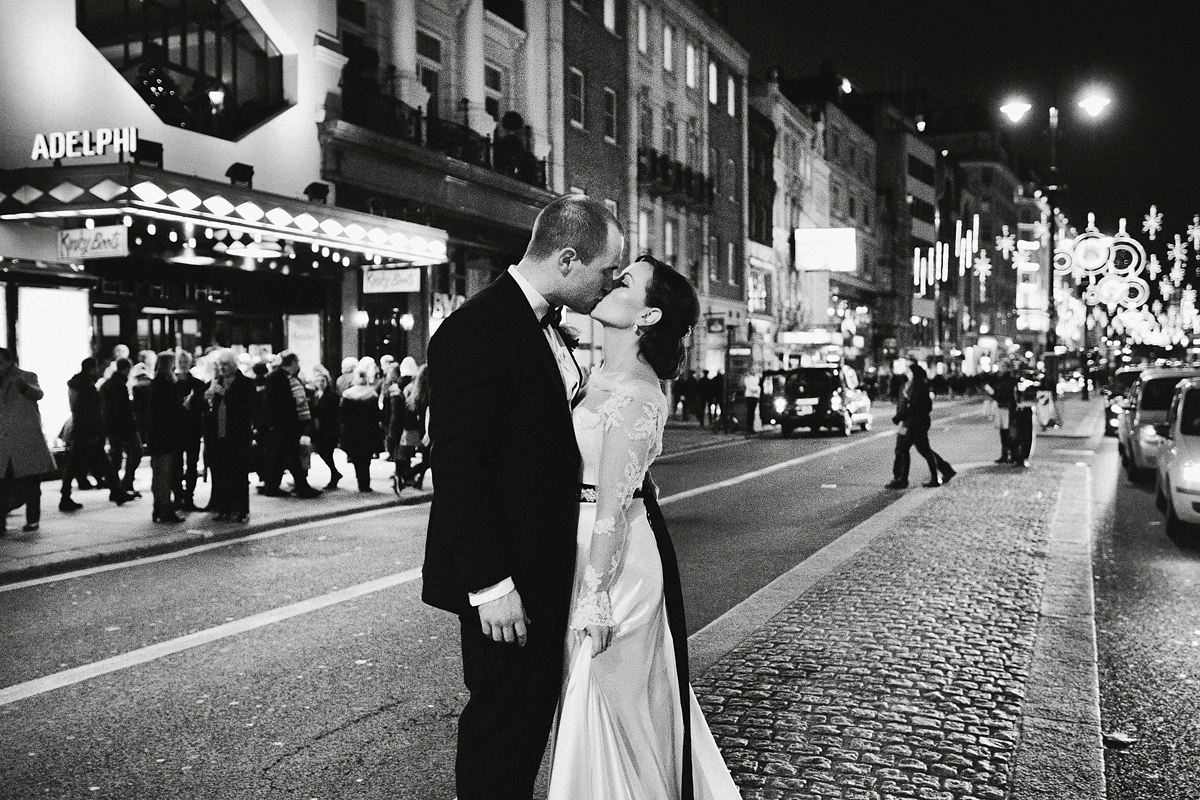 Antonietta wore a chic and elegant long sleeved Suzanne Neville gown for her black tie winter wedding at the RSA in London.