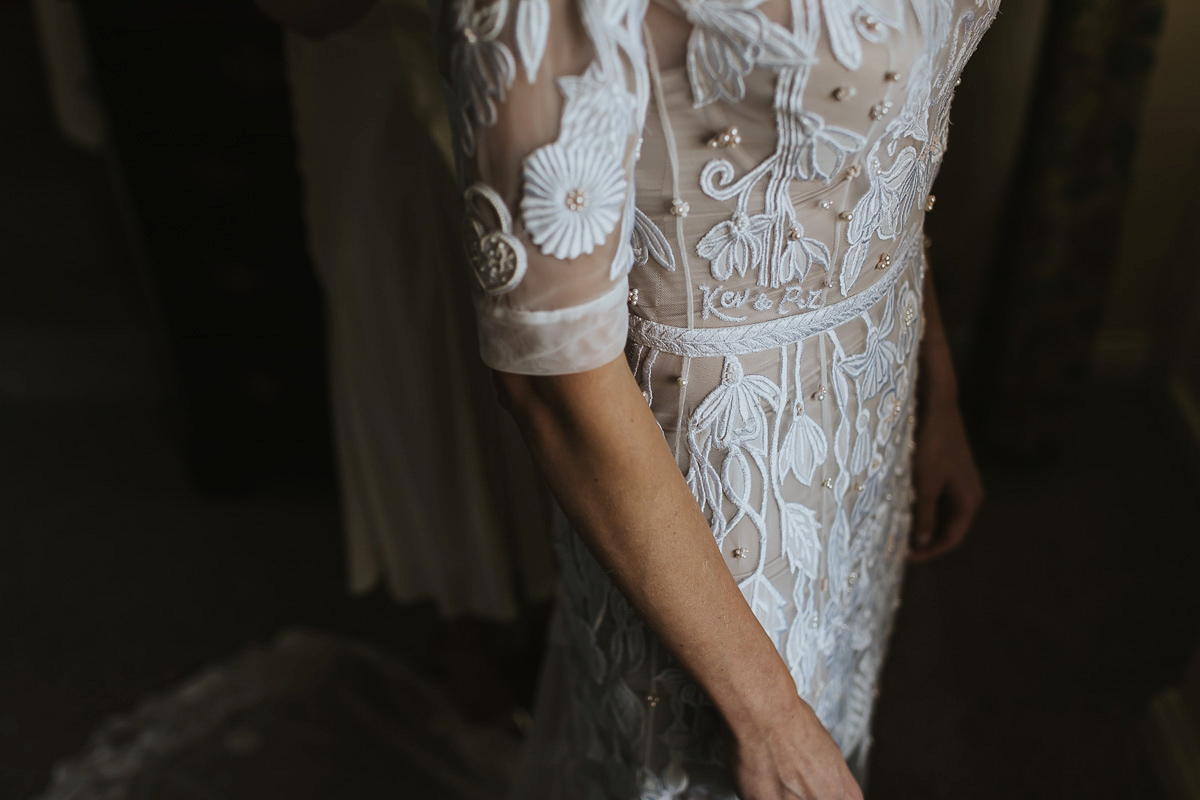 Kate were a personalised and embroidered Hermione de Paula gown for her Cripps Barn Wedding. Photography by Lee Garland.