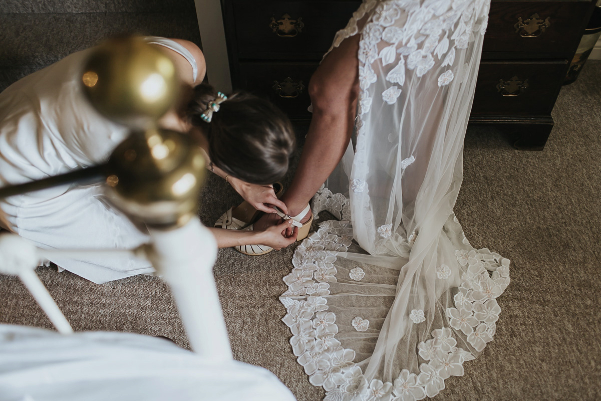 Kate were a personalised and embroidered Hermione de Paula gown for her Cripps Barn Wedding. Photography by Lee Garland.