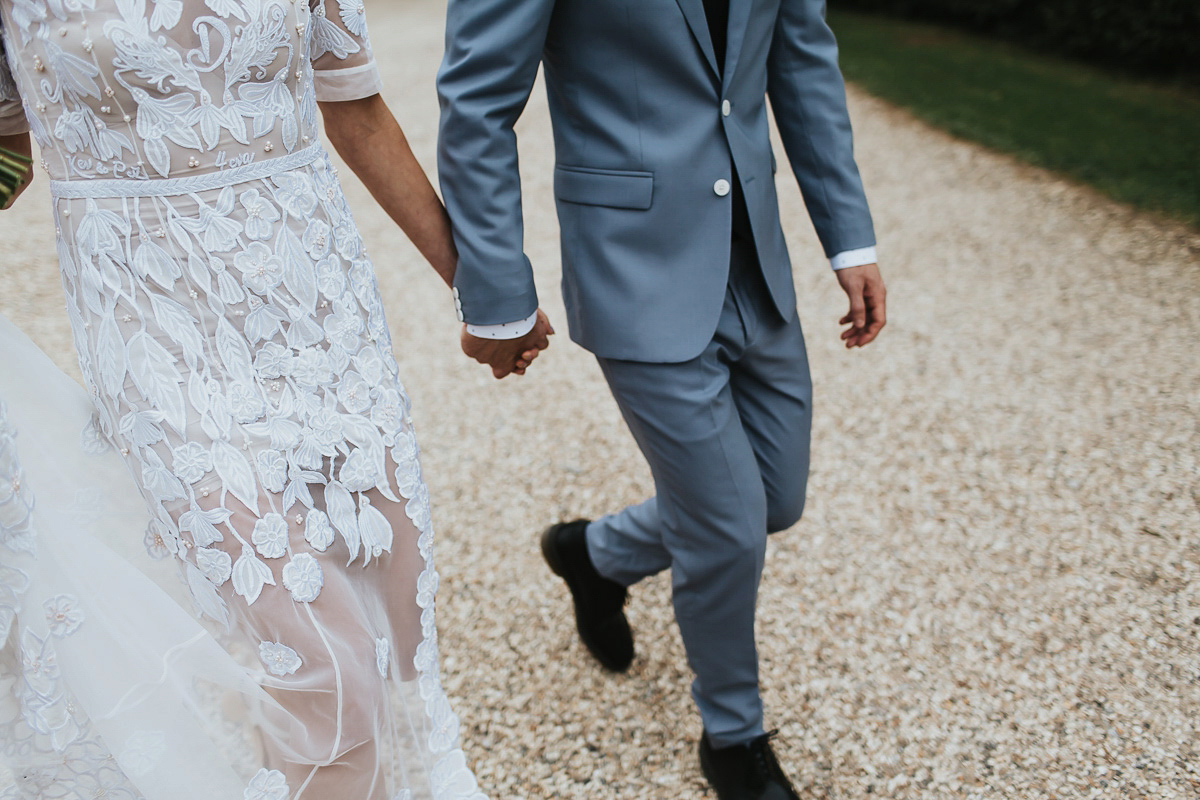 Kate were a personalised and embroidered Hermione de Paula gown for her Cripps Barn Wedding. Photography by Lee Garland.