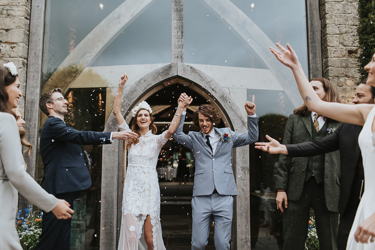 Kate were a personalised and embroidered Hermione de Paula gown for her Cripps Barn Wedding. Photography by Lee Garland.