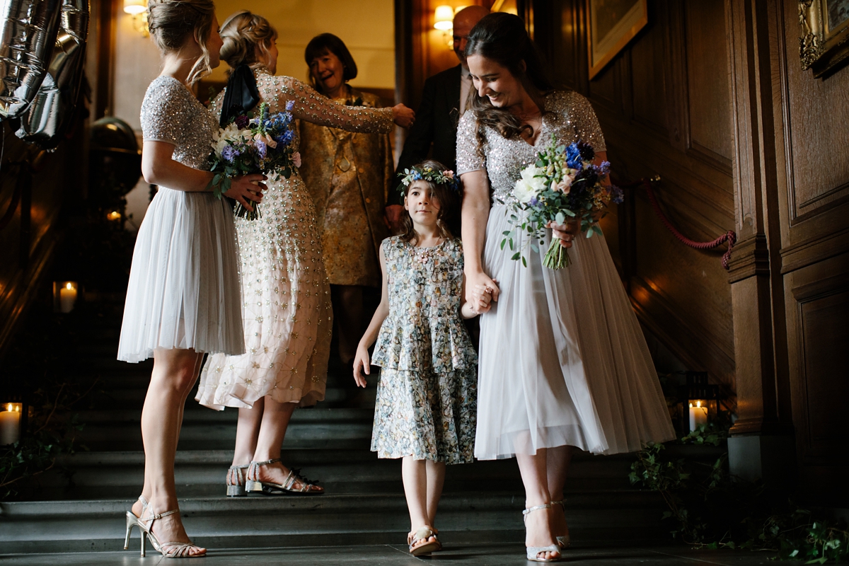 A bride in a gold, embellished Temperley London dress for her wedding at Rowallan Castle in Scotland. Images by Caro Weiss.