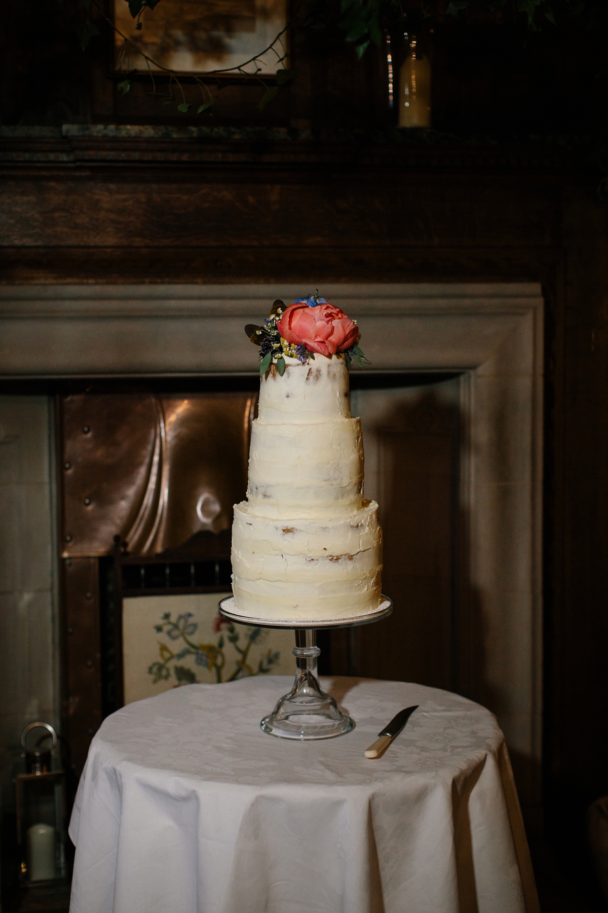 A bride in a gold, embellished Temperley London dress for her wedding at Rowallan Castle in Scotland. Images by Caro Weiss.