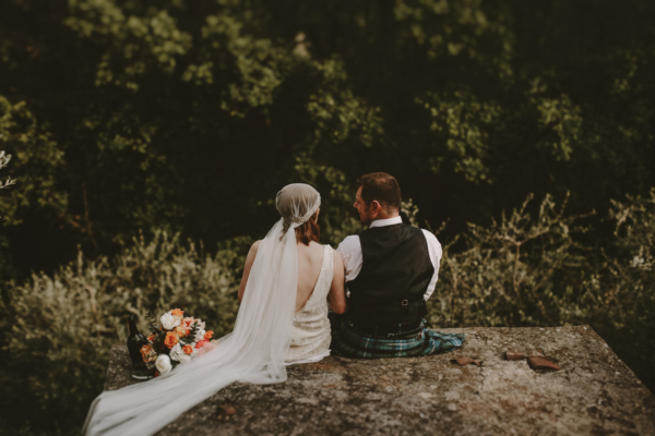 An Italian Country Wedding with a Charlie Brear Gown and Bridesmaids in Peach