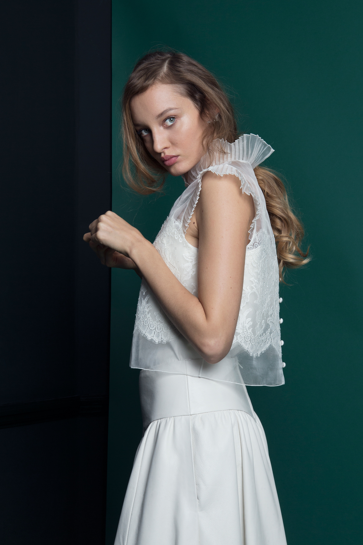 WREN LACE TOP WORN OVER LUKA LEATHER CAMISOLE SKIRT SIDE VIEW 2 - Introducing the Exquisite New Atlantis Collection by Halfpenny London WREN LACE TOP WORN OVER LUKA LEATHER CAMISOLE SKIRT SIDE VIEW 2