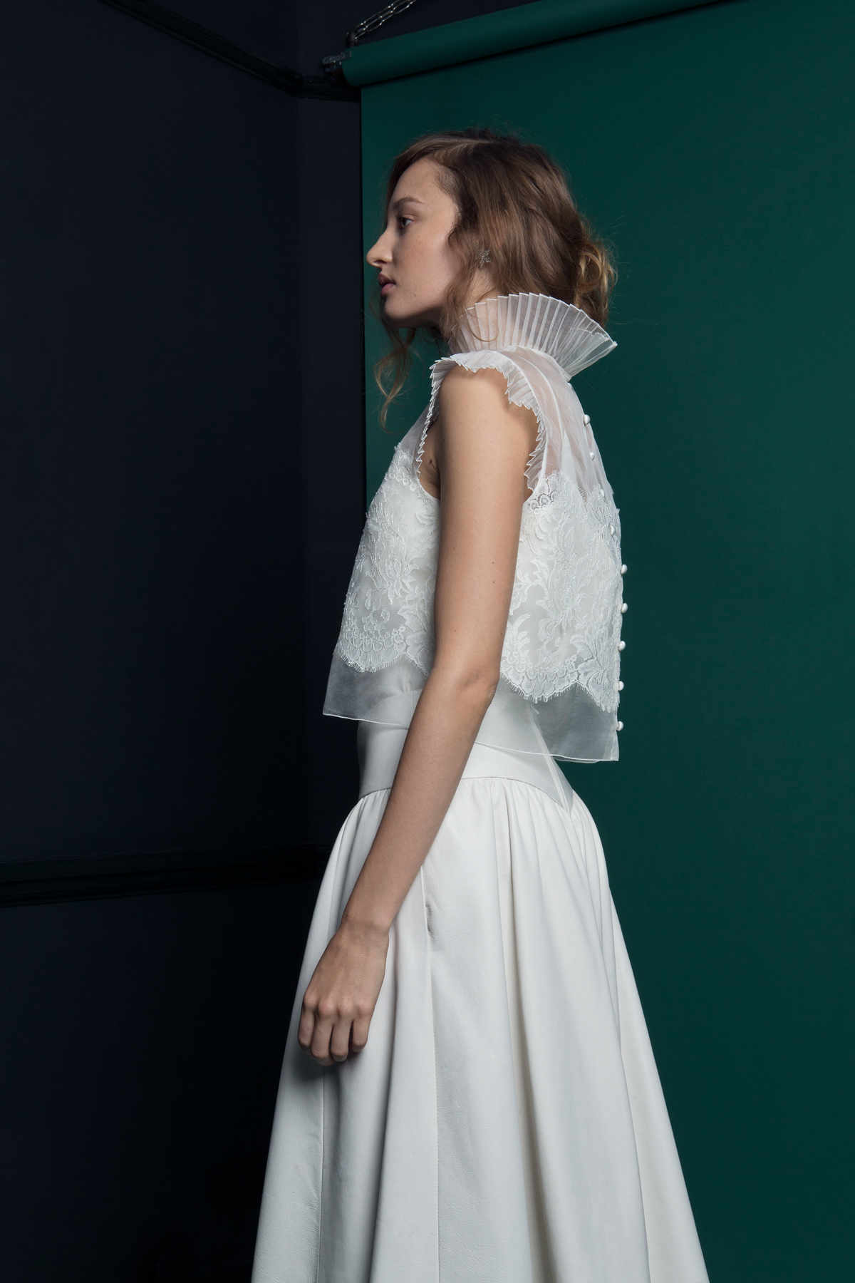 WREN LACE TOP WORN OVER LUKA LEATHER CAMISOLE SKIRT SIDE VIEW 3 - Introducing the Exquisite New Atlantis Collection by Halfpenny London WREN LACE TOP WORN OVER LUKA LEATHER CAMISOLE SKIRT SIDE VIEW 3