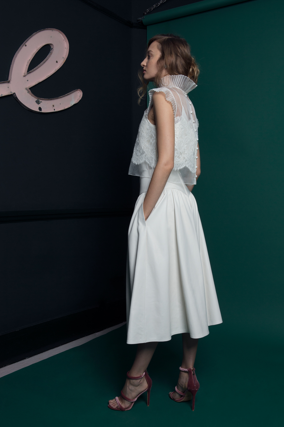 WREN LACE TOP WORN OVER LUKA LEATHER CAMISOLE SKIRT SIDE VIEW 4 1 - Introducing the Exquisite New Atlantis Collection by Halfpenny London WREN LACE TOP WORN OVER LUKA LEATHER CAMISOLE SKIRT SIDE VIEW 4 1
