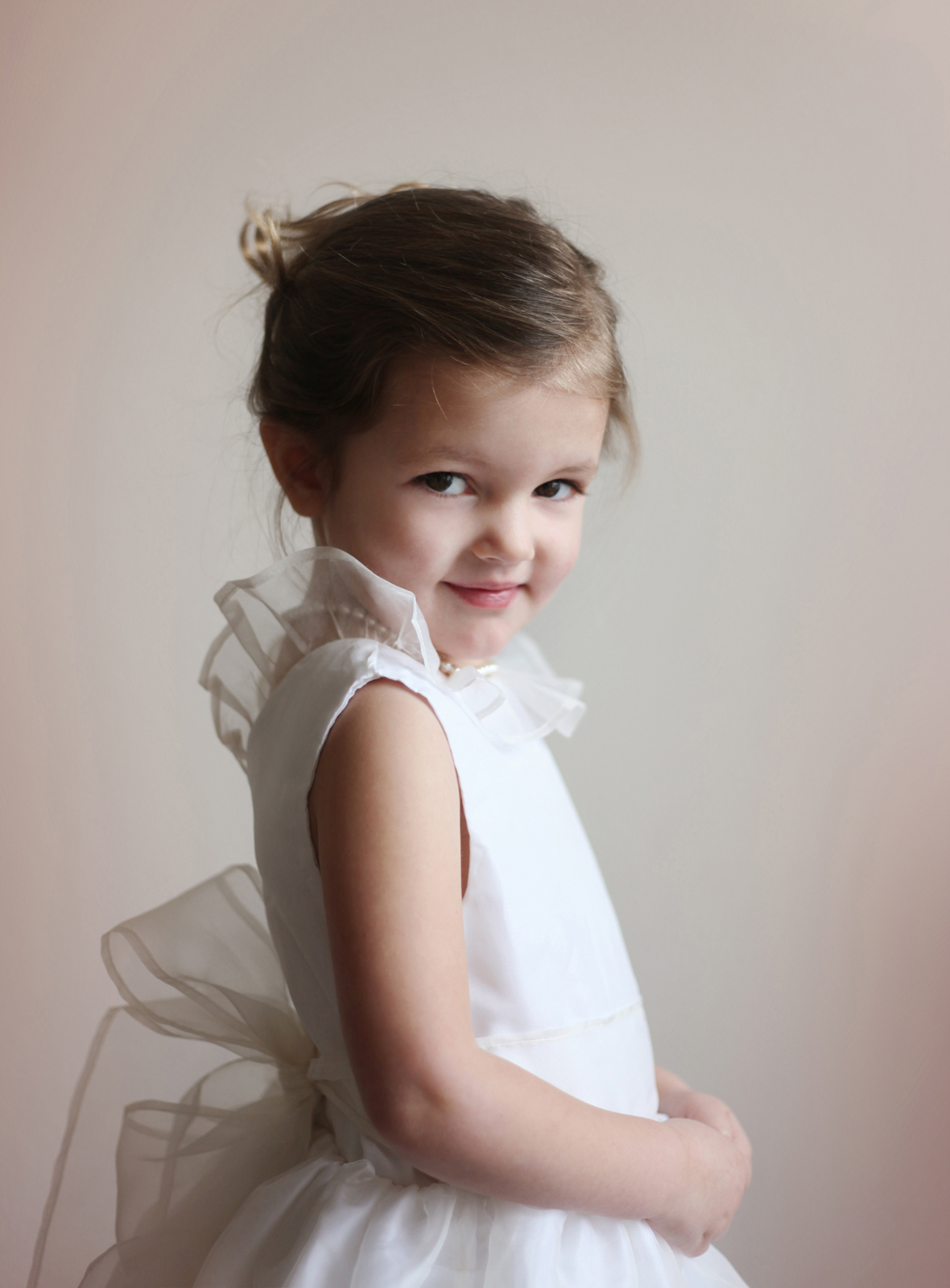 Chloe off white silk organza designer flowerr girl dress with frill organza collar and sash by French UK designer Little Eglantine