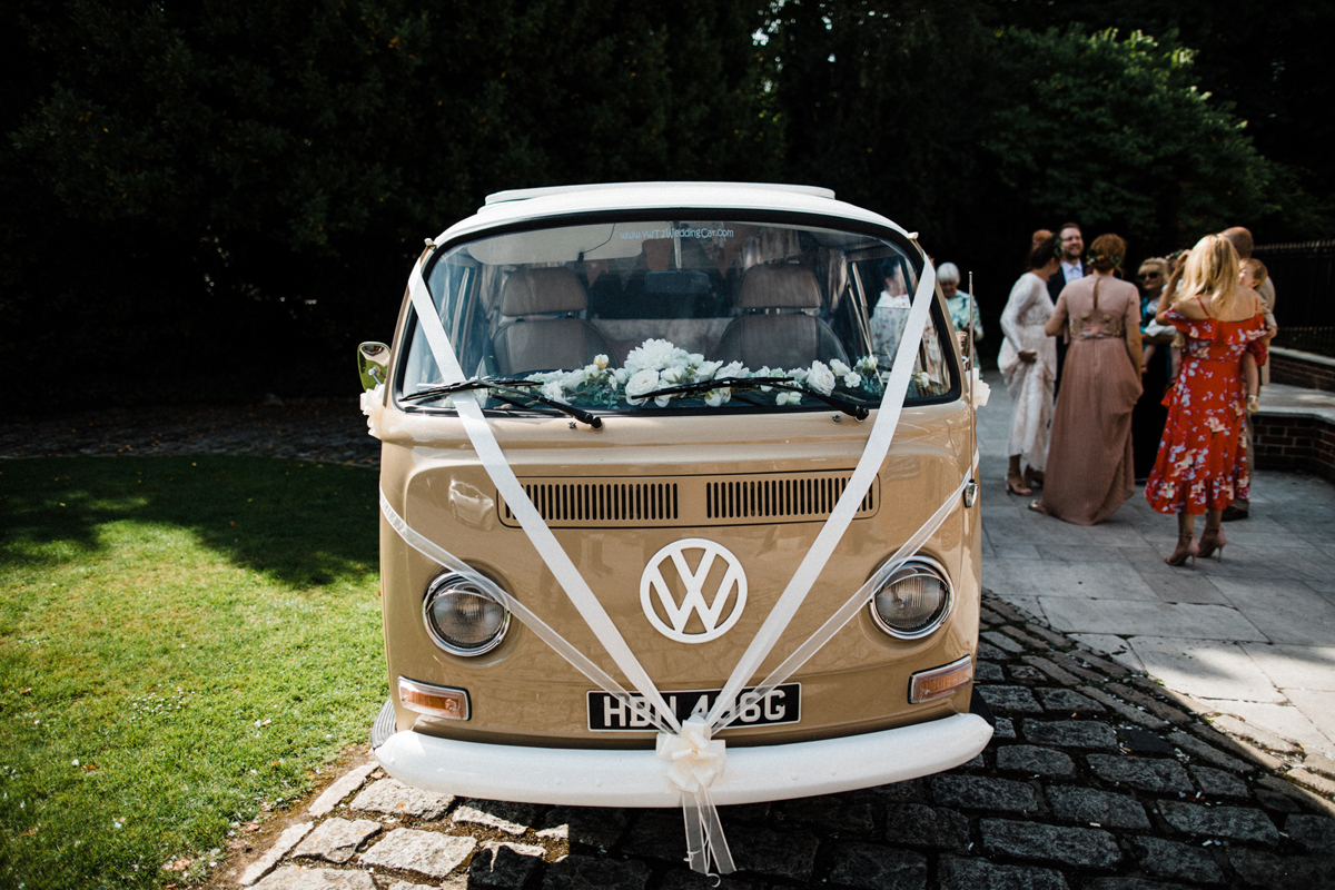 1 Beige VW camper van with wedding ribbons